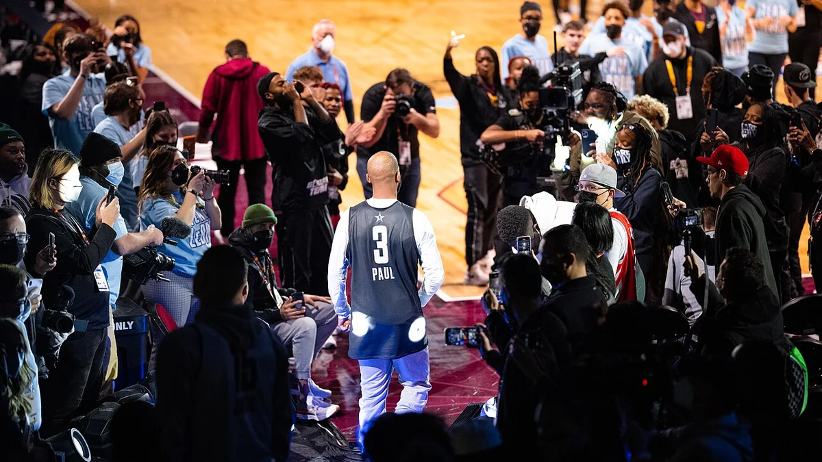Chris Paul, the Winston-Salem native the new mural honors, walks onto the court at an NBA All-Star Weekend event. The picture does not show the mural.