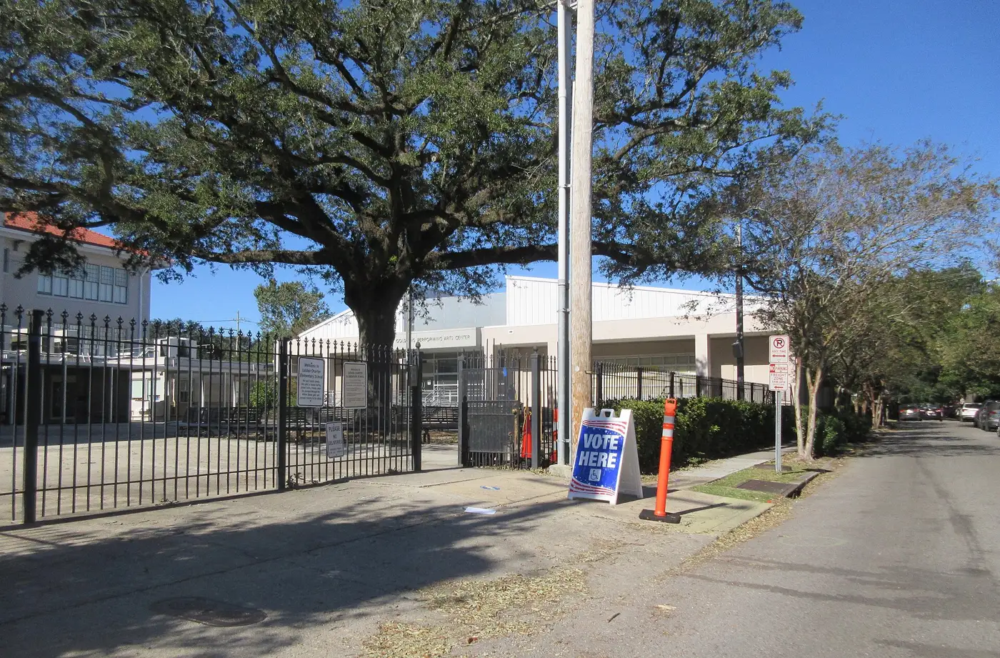 A "Vote Here" sign outside a polling place in New Orleans. The picture was not taken in Forsyth County.