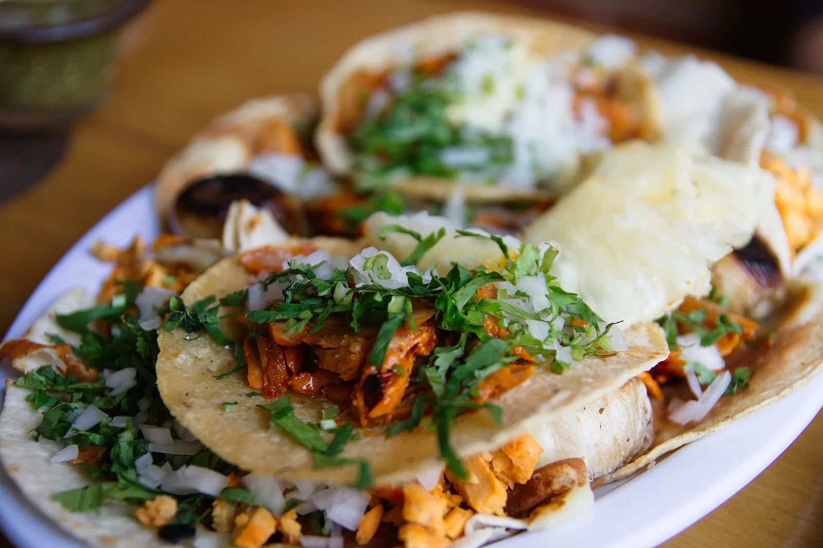 Tacos al pastor with onion and cilantro. The photo was not taken at a Winston-Salem restaurant.