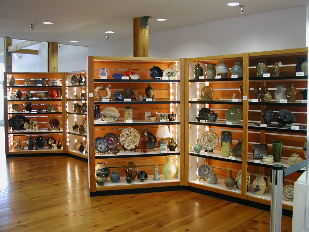 Handmade North Carolina pottery on display shelves at the North Carolina Pottery Center in Seagrove, N.C.