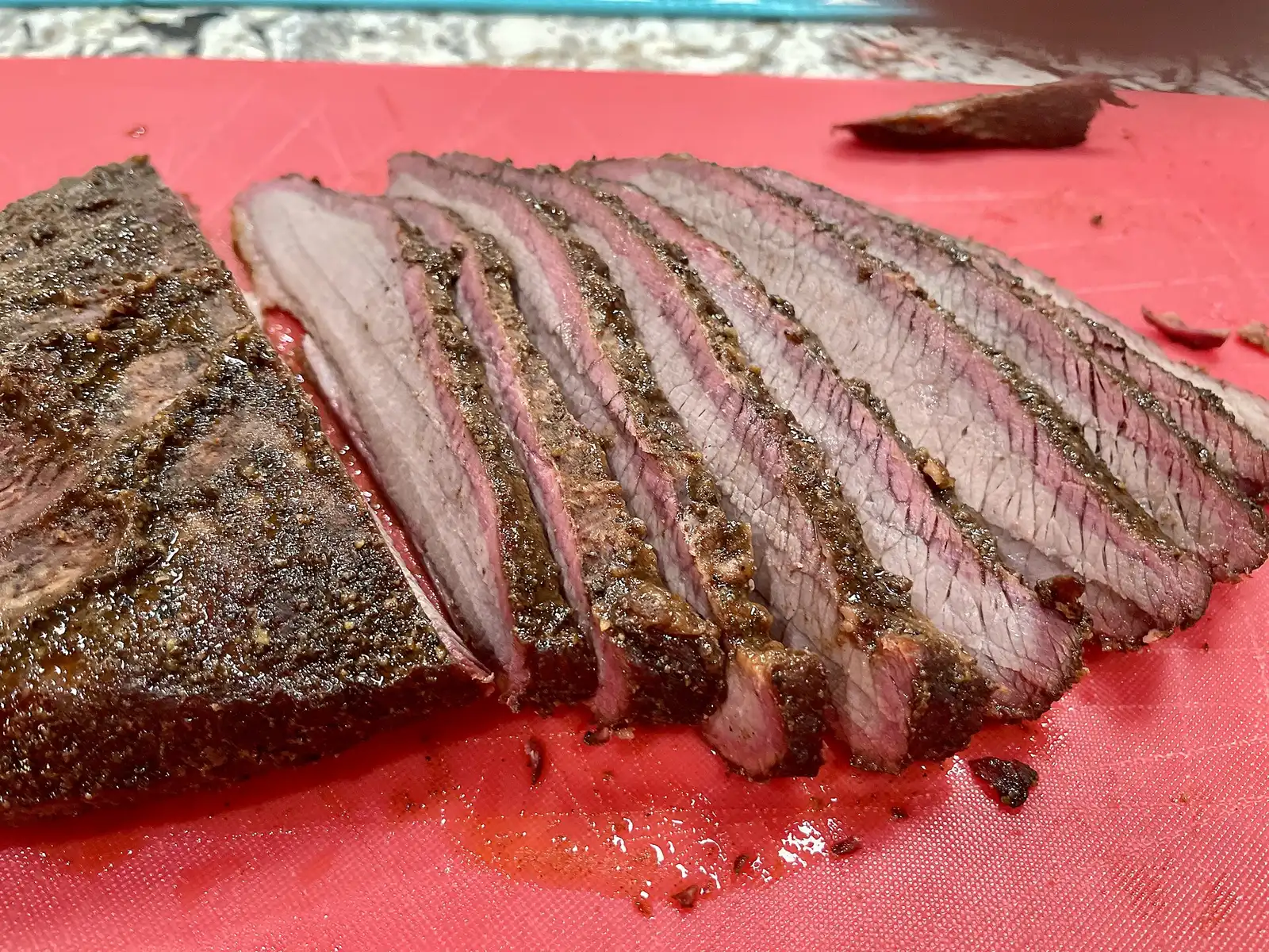 Sliced smoked brisket showing its smoke ring. The photo was not taken at a Winston-Salem restaurant.