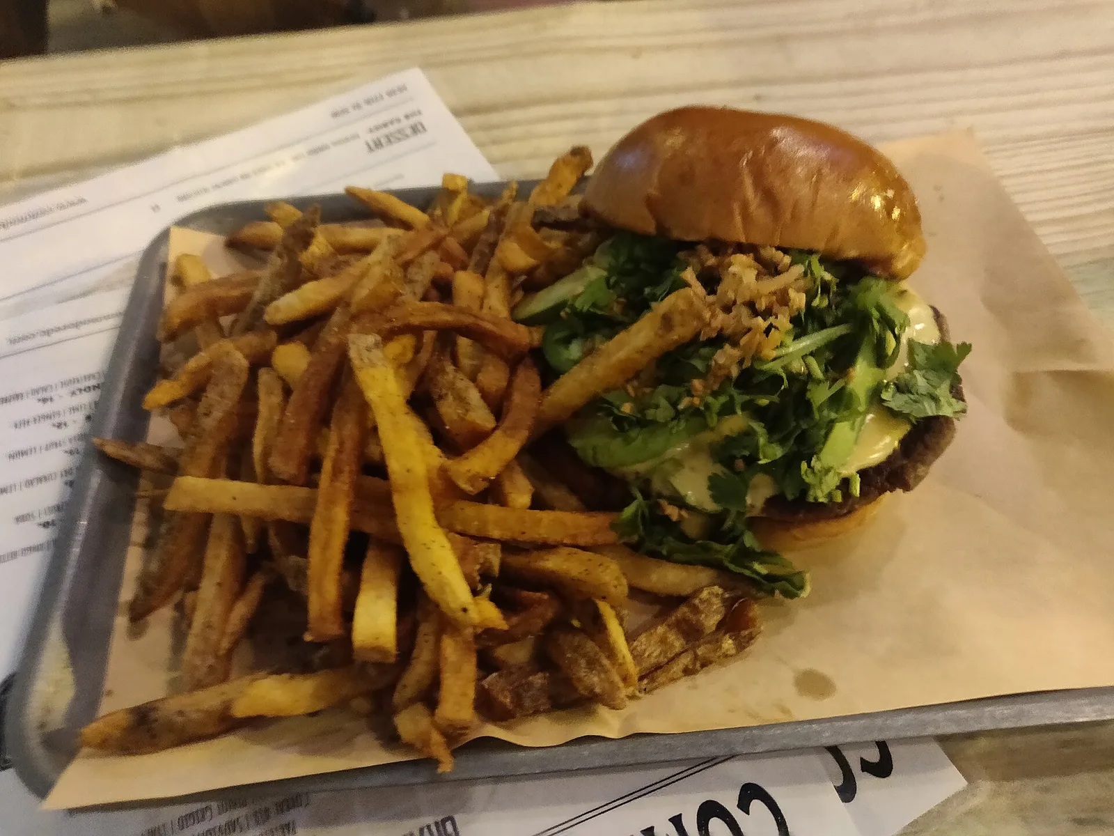 A cheeseburger with fries. The photo was not taken at a Winston-Salem restaurant.