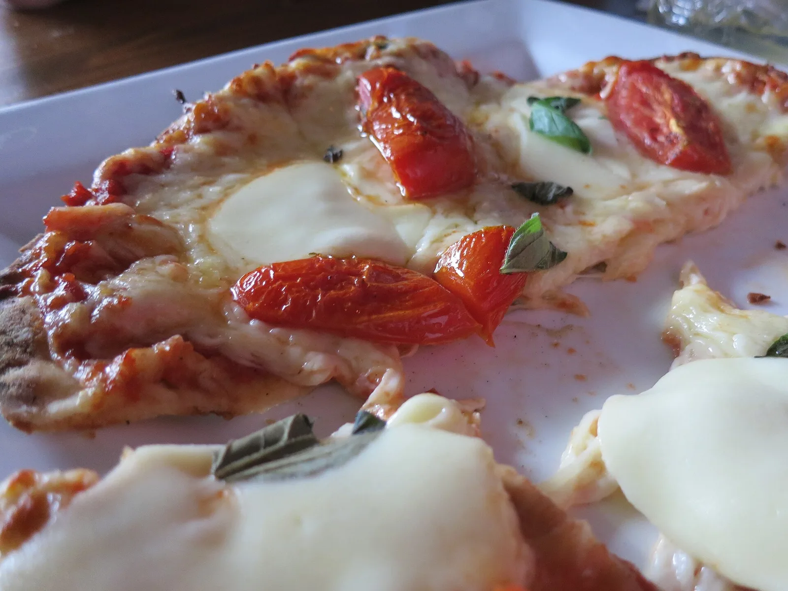 A margherita pizza with basil and fresh mozzarella. The photo was not taken at a Winston-Salem restaurant.