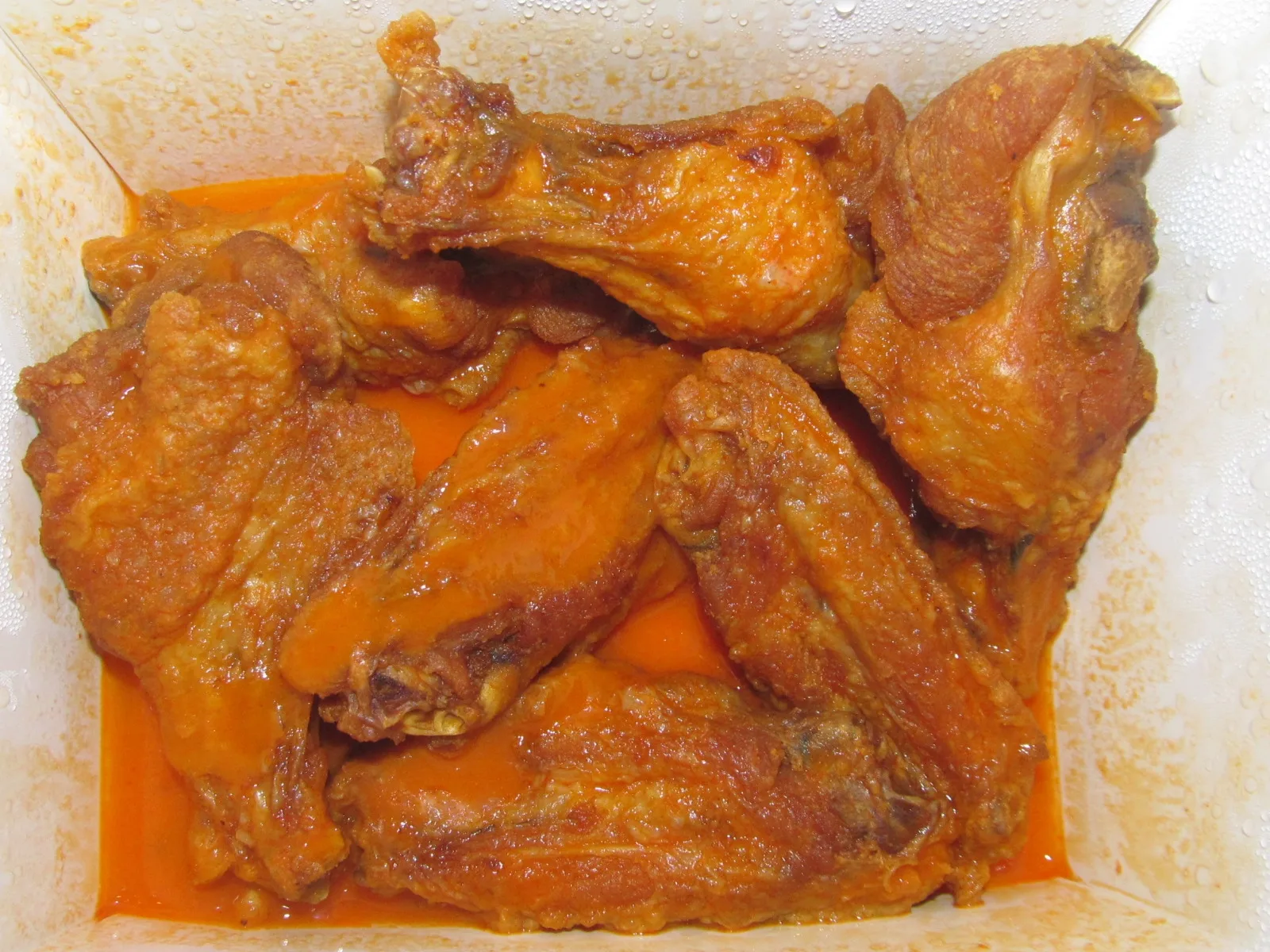 Buffalo chicken wings on a plate. The photo was not taken at a Winston-Salem restaurant.